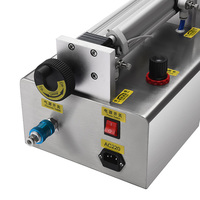 Machine de remplissage semi-automatique horizontale à piston pneumatique pour crème visage, lotion corporelle et conditionnement en pots de soins de la peau