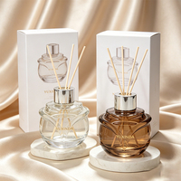 Diffuseur de parfum en verre avec motif floral élégant, flacon vide personnalisé coloré et boîte d'emballage sur mesure