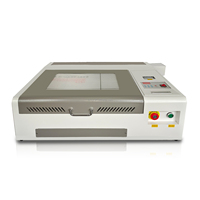 Petite machine portable de découpe et de gravure laser Co2 Machine de gravure de timbres Machine de gravure laser sur bois