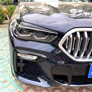 BMW X5 X6 G05 G06 2019+ สติ๊กเกอร์ตกแต่งคิ้วไฟหน้า สีดำเปียโน ABS สติ๊กเกอร์ติดตัวถัง - Product Image 2