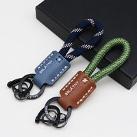Porte-clés de voiture en cuir véritable fait main, cordon tressé, pendentif personnalisable avec logo, lanière anti-perte