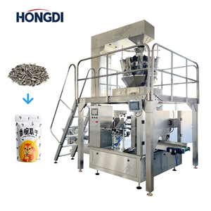 Báscula combinada totalmente automática combinada con una máquina de envasado de 8 estaciones para gránulos alimenticios - Product Image 1