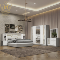 Ensemble de chambre à coucher moderne haut de gamme King-Size avec armoire en bois peint à 6 portes et fonction massage, mobilier de chambre de luxe