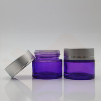Großhandel Leere Lila Glas-Hautpflege-Tiegel mit Schwarzem, Goldenem oder Silbernem Deckel, Nachfüllbare Gesichtscreme-Glasbehälter 30g 50g 100g