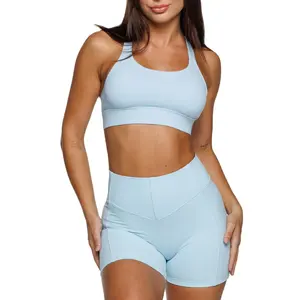 Ensemble de yoga pour femmes personnalisable pour l'entraînement physique Ensembles de yoga ajustables doux et au beurre Soutien-gorge et short de motard Ensemble de sport 2 pièces