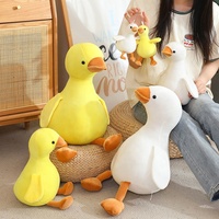 Jouets en peluche en gros : Petits canards jaunes et grandes oies blanches douces, pour la décoration intérieure et les cadeaux d'anniversaire pour enfants