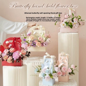 Caja <span class=keywords><strong>de</strong></span> Regalo <span class=keywords><strong>de</strong></span> Flores Ovalada Portátil <span class=keywords><strong>de</strong></span> Cartón, Caja Etérea con Mariposas, Caja <span class=keywords><strong>de</strong></span> Embalaje con Mariposas Recortadas para Flores Frescas - Product Image 1