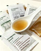 Vinaigrette OEM à l'huile d'olive et au vinaigre de cidre, durée de conservation de 18 mois, conditionnement en portions, directement de l'usine, condiment pour salades et repas légers