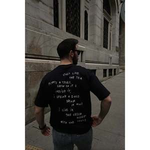 Camiseta Deportiva Negra 100% Algodón Orgánico, 230g de Peso de Tela, Impresión Serigráfica en la Espalda, Comprimida - Product Image 2