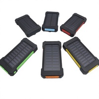 Batterie solaire portable 10000mAh à succès avec lampe de camping, boussole, câble intégré et double sortie USB