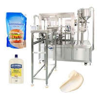 Machine de remplissage et de bouchage automatique haute vitesse à 4 buses pour sachets souples de liquides, sauces et pâtes (eau pure)