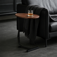 Table basse ovale moderne minimaliste en bois foncé avec cadre en C et structure en acier robuste – Meuble gain de place pour canapés et lits