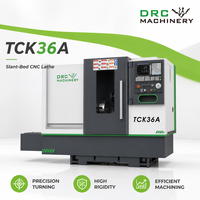 Tour CNC à banc incliné TCK36A, broche simple, commande GSK 2 axes, haute précision 0,008 mm, économie d'énergie, travail des métaux automatique, garantie 1 an