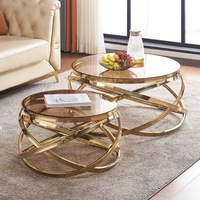 Table basse moderne multifonctionnelle en acier inoxydable avec plateau en verre trempé et marbre, design simple et créatif