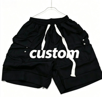 Shorts de sport personnalisés pour hommes en nylon respirant et écologique, service OEM, design avec cordon de serrage