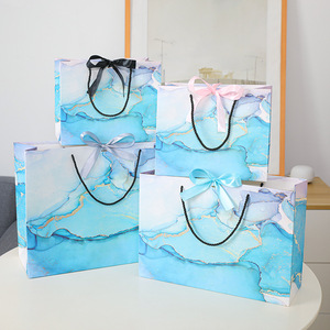 Sacs cadeaux en papier blanc de luxe écologiques en gros avec poignées en ruban personnalisables pour chaussures et vêtements - Product Image 2