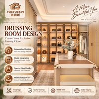 Dressing sur mesure en bois de noyer foncé avec miroir central et étagères éclairées par LED pour vestiaires de villas de luxe