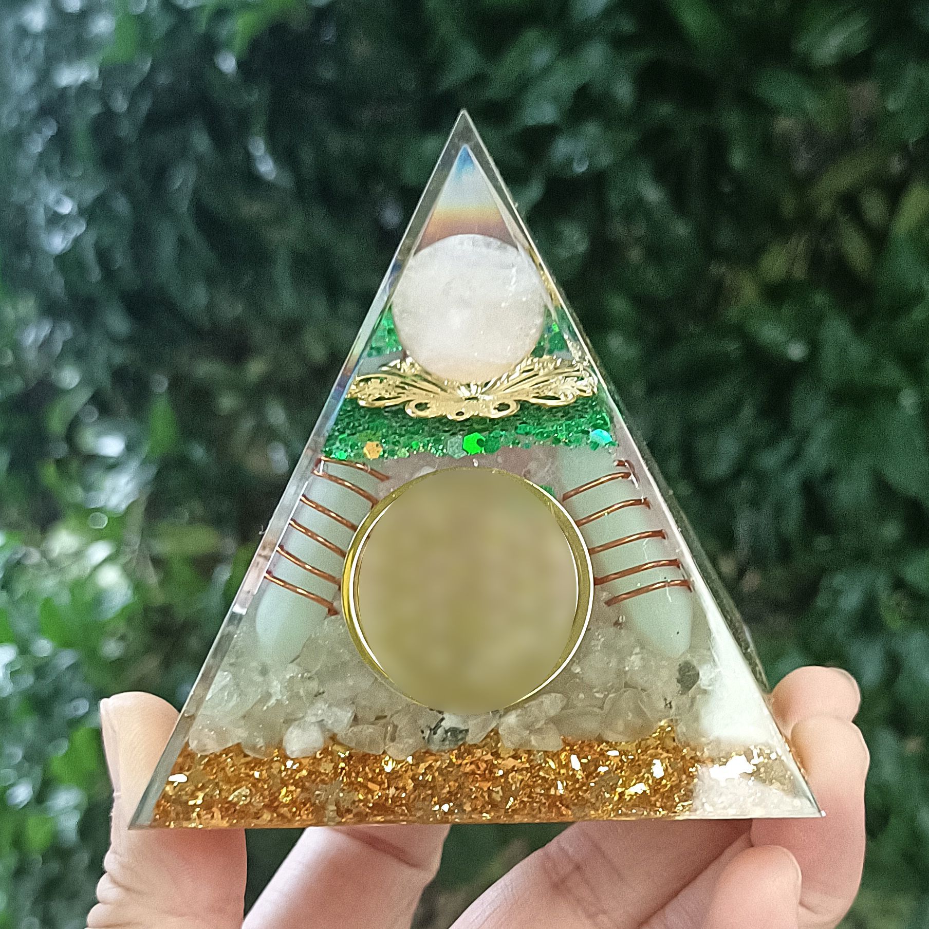 White sphere with green East Asiatica pillar