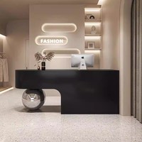 Comptoir de réception personnalisé en bois pour spa et salon, avec boule en acier inoxydable, pour la vente de vêtements, noir