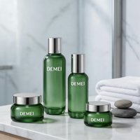 Ensemble d'emballages cosmétiques en verre vert personnalisés OEM avec bouchon en caoutchouc et sérigraphie, capacités 100ml/200ml/50g/100g pour toner, sérum et crème