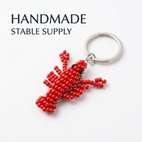 Porte-clés pendentif de sac tendance en forme de homard perlé fait main rouge