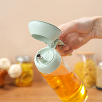 Bouteille de verseur d'huile d'olive en verre à haute teneur en borosilicate de 600ml distributeur de vinaigre de forme ronde avec récipient de contrôle de graduation