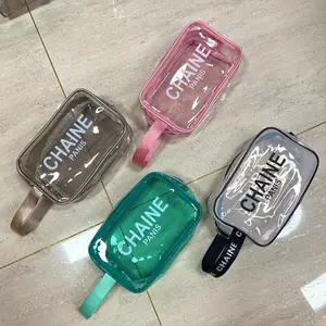 Özel logo PVC şeker renk şeffaf hediye kesesi yıkama seyahat makyaj kozmetik saplı çanta