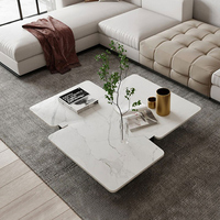 Design créatif Table basse italienne minimaliste irrégulière Table basse moderne pour salon en marbre