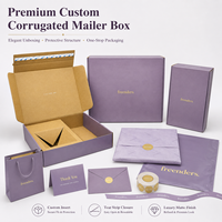 Boîte d'expédition en carton ondulé personnalisée, ensemble violet avec design élégant pour l'emballage de produits cosmétiques, de mode et de boutique.