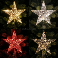 Handgefertigter Moderner Kunststoff-Stern mit Federbasis als Baumspitzen-Dekoration für Weihnachtsbäume und Festtagsdekorationen