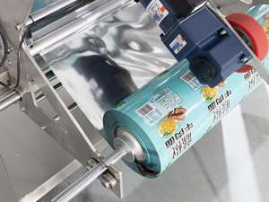 Máquina de Envasado de Alimentos con Pesaje Multicabezal y Sellado Cuádruple para Frutos Secos, Miel, Dátiles, Galletas, Bocadillos Inflados - Product Image 6