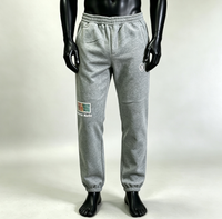 Pantalon de jogging gris sérigraphié en molleton éponge, taille élastique, coupe ajustée décontractée, jambe large, léger pour homme
