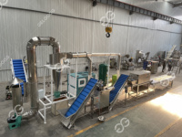Chine Petite machine automatique à casser et à éplucher les bulbes d'ail et de gingembre Machine à éplucher l'ail et l'oignon similaire