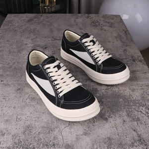 Baskets basses classiques en toile noire rétro de luxe pour hommes et femmes, à lacets, style décontracté - Product Image 1