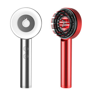 หวีนวดไฟฟ้า แสงสีแดง บำรุงหนังศีรษะ เอสเซนส์บำรุงเส้นผม หวีนำเข้า สเปรย์ดูแลการเจริญเติบโตของเส้นผม เพื่อสุขภาพผมที่ดี - Product Image 1