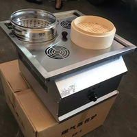 Port de vidange indépendant sur la cuve à vapeur pour dim sum permettant une évacuation rapide des eaux usées et des graisses pour l'entretien régulier