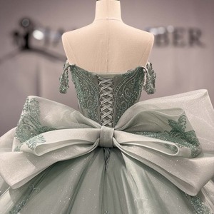 Robe de bal de Quinceañera de luxe vert sauge Dy1563 avec corsage à sequins en forme de cœur, nœud surdimensionné et jupe en tulle superposée Jancember - Product Image 6