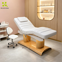 Lit de massage électrique personnalisé avec base en métal imitation bois, système à 4 moteurs, fonction chauffante, revêtement PU, pour extensions de cils et spa