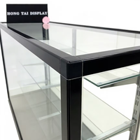 Vitrine en verre trempé avec cadre noir, éclairage LED, robuste, écologique, étagères réglables |   Vitrine de présentation verrouillable pour