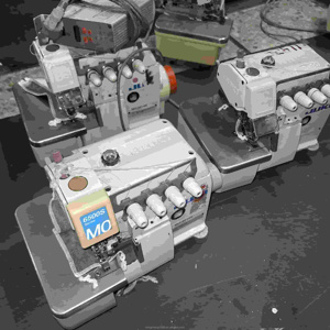 Máquina de Coser Overlock Industrial Automática Usada MO6514 con Motor de Embrague, Alta Velocidad 6000 Puntadas/min, Grosor de Costura de 7MM - Product Image 1