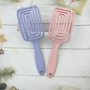 Peigne élastique incurvé à dents larges en plastique pour cheveux secs ou mouillés, usage domestique - Product Image 1