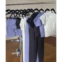 Ensemble de sport deux pièces respirant et personnalisé pour femme : haut court à manches courtes et legging de compression sans couture à dos froncé, haute qualité