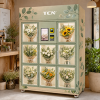 Fournisseur de distributeurs automatiques de fleurs fraîches réfrigérées en libre-service 24h/24 et 7j/7 avec écran tactile et paiement par billets, pièces et cartes de crédit