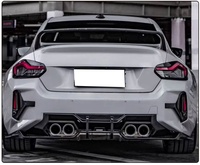 2023 + vente chaude fibre de carbone voiture pare-chocs arrière diffuseur lèvre pour BMW M2 G87 lèvre arrière sangle lumière arrière diffuseur