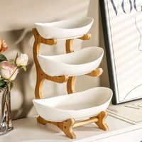 Minimalistische design drie-laags ronde houten fruitschaal met 2-3 liter capaciteit voor gebruik in de woonkamer en keuken, draagbare opbergoplossing voor servies.