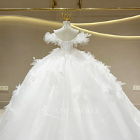 Robe de mariée élégante Jancember JFH118, style robe de bal à épaules dénudées, avec volants et plumes