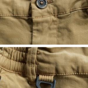 TKAN158D Pantalones de trabajo de mezclilla ajustados para hombre, pantalones de chándal de estilo informal con múltiples bolsillos con solapa y palabras - Product Image 2