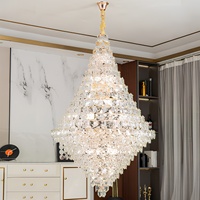 Lustre LED en cristal doré, idéal pour les atriums d'hôtels, les villas et les salons avec escaliers en colimaçon