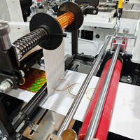 Machine de découpe automatique rouleau à rouleau à commande PLC pour le traitement des matériaux d'emballage d'étiquettes, avec moteur comme composant central