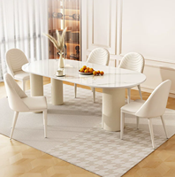 Ensemble de table et de chaises de salle à manger de restaurant moderne et durable en pierre frittée avec couleurs personnalisées, design ovale pour usage commercial